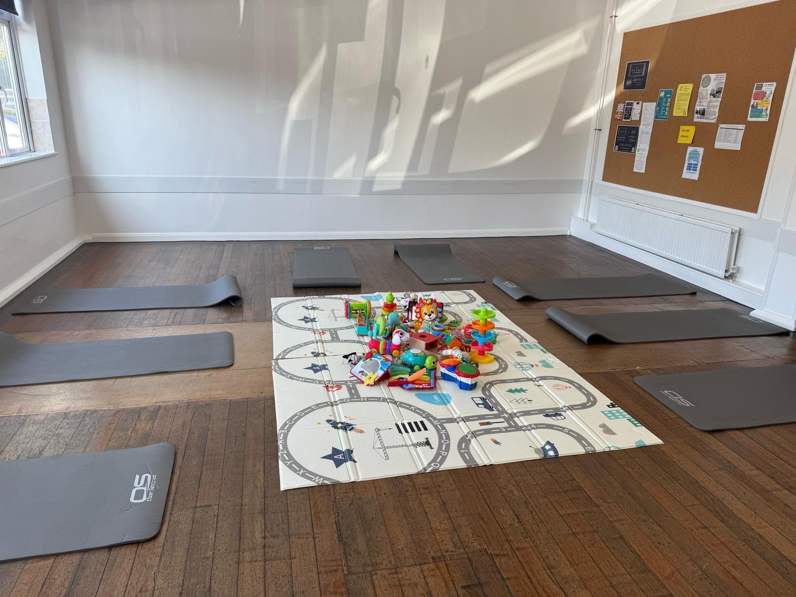 Exercise mats and equipment laid out ready for class